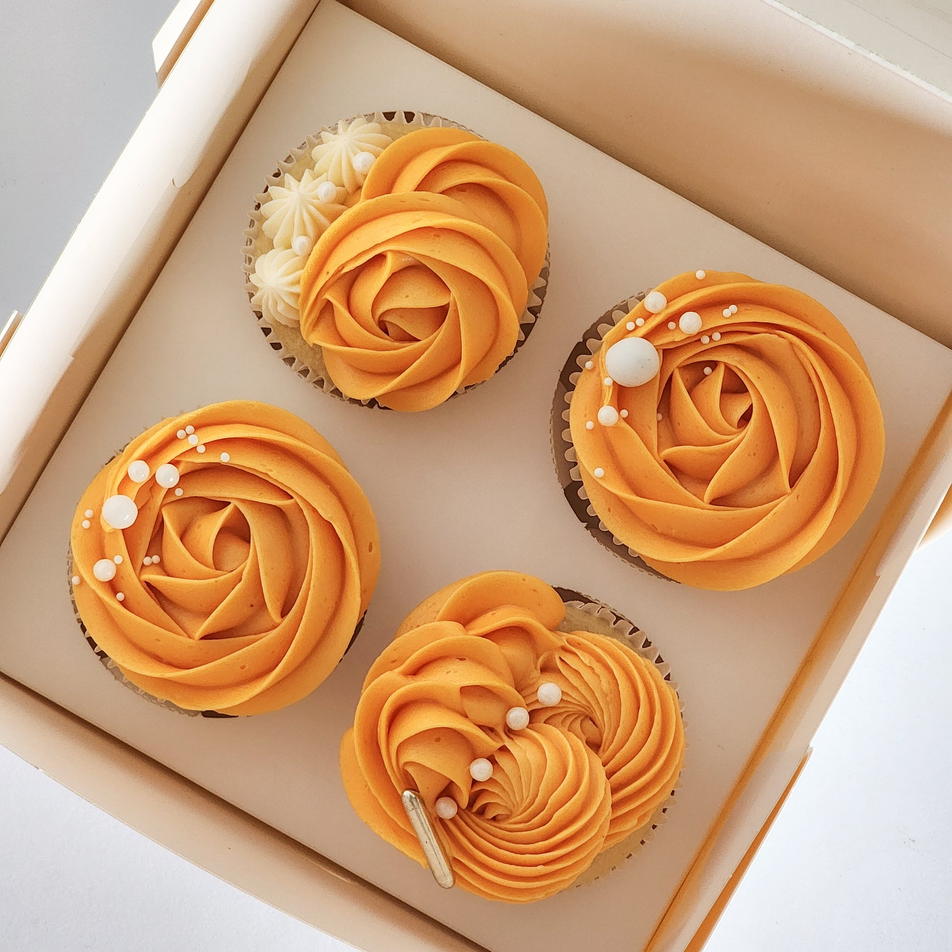 quick and easy swiss meringue buttercream frosting on cupcakes