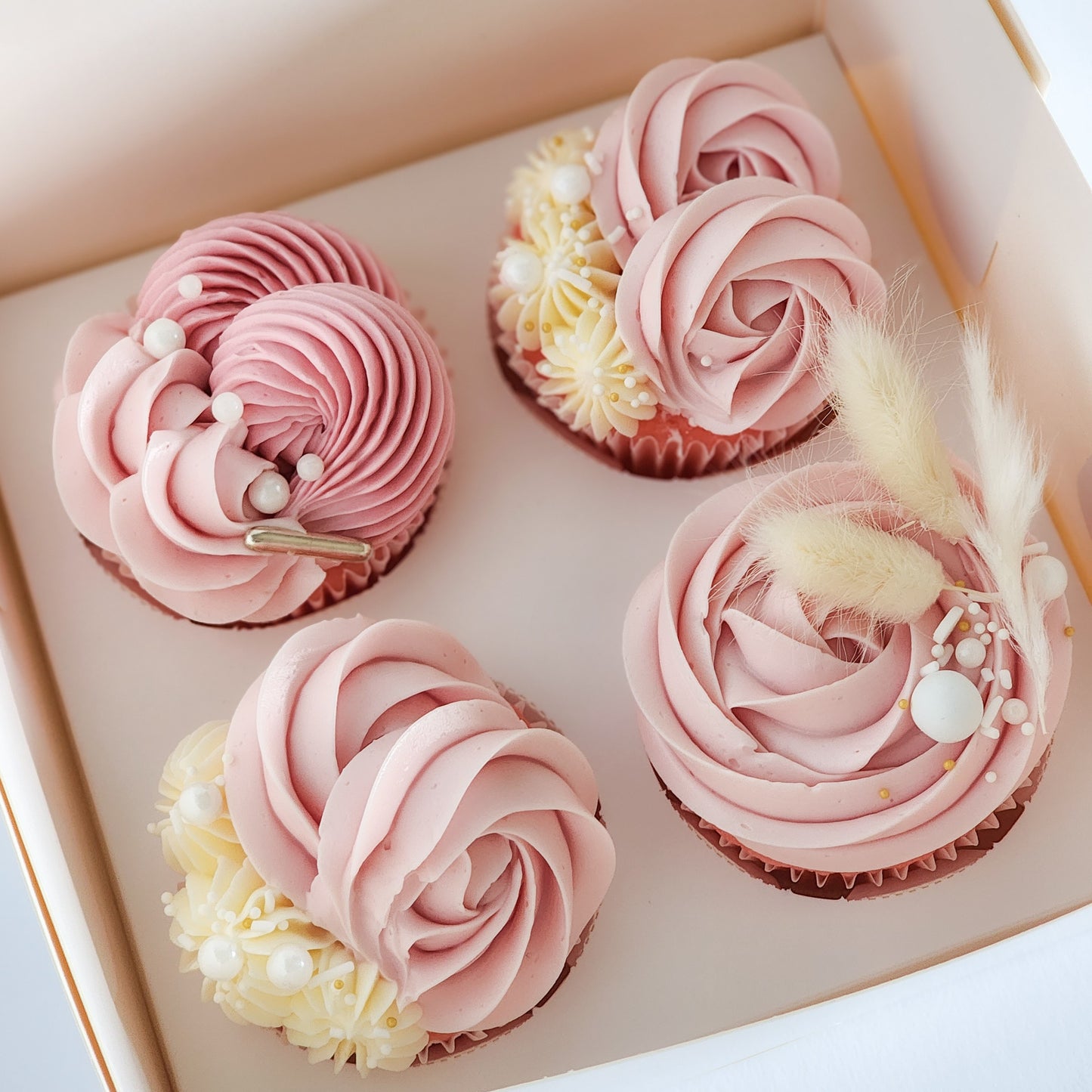 Beautiful strawberry cupcakes with strawberry swiss meringue buttercream frosting